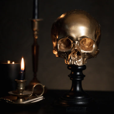 aureate gold skull plinth - the blackened teeth - gothic home decor